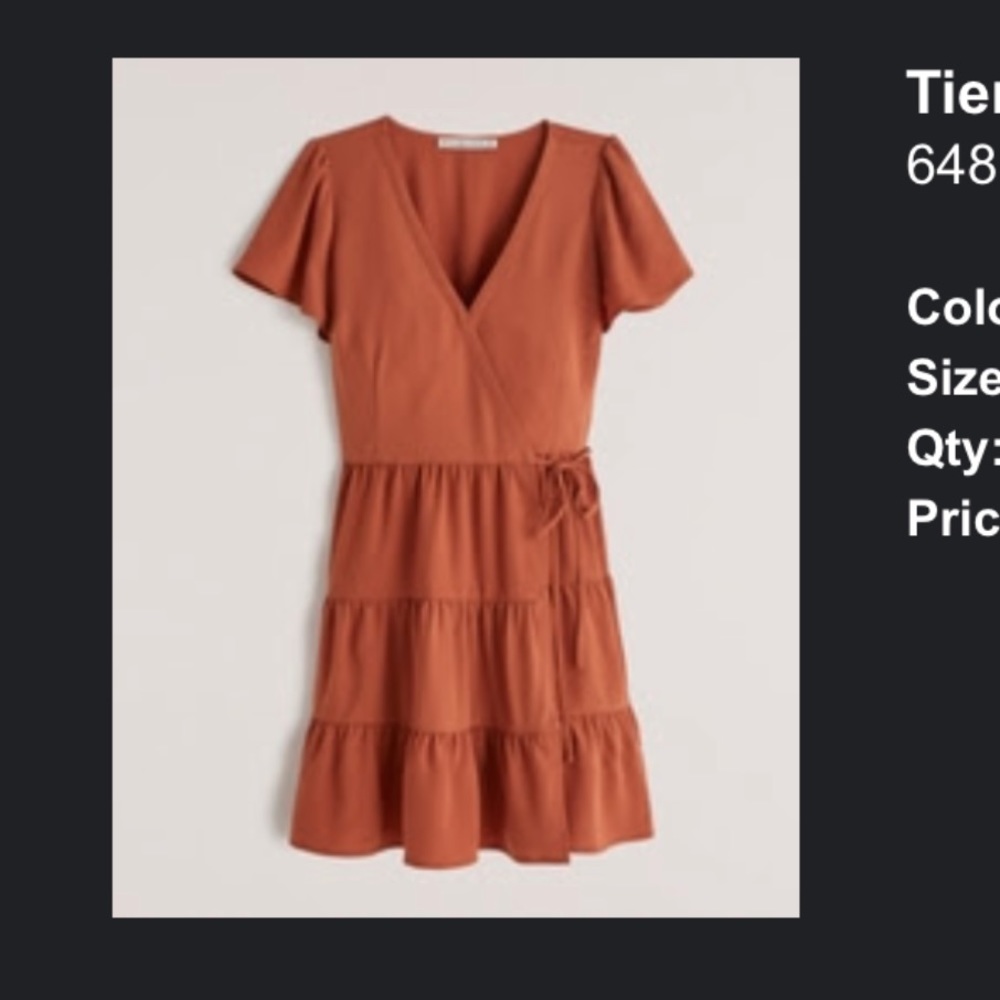 Tiered burnt orange wrap mini dress